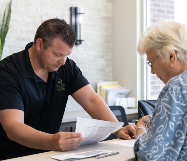 Williams Group CPA accountant meeting with a client
